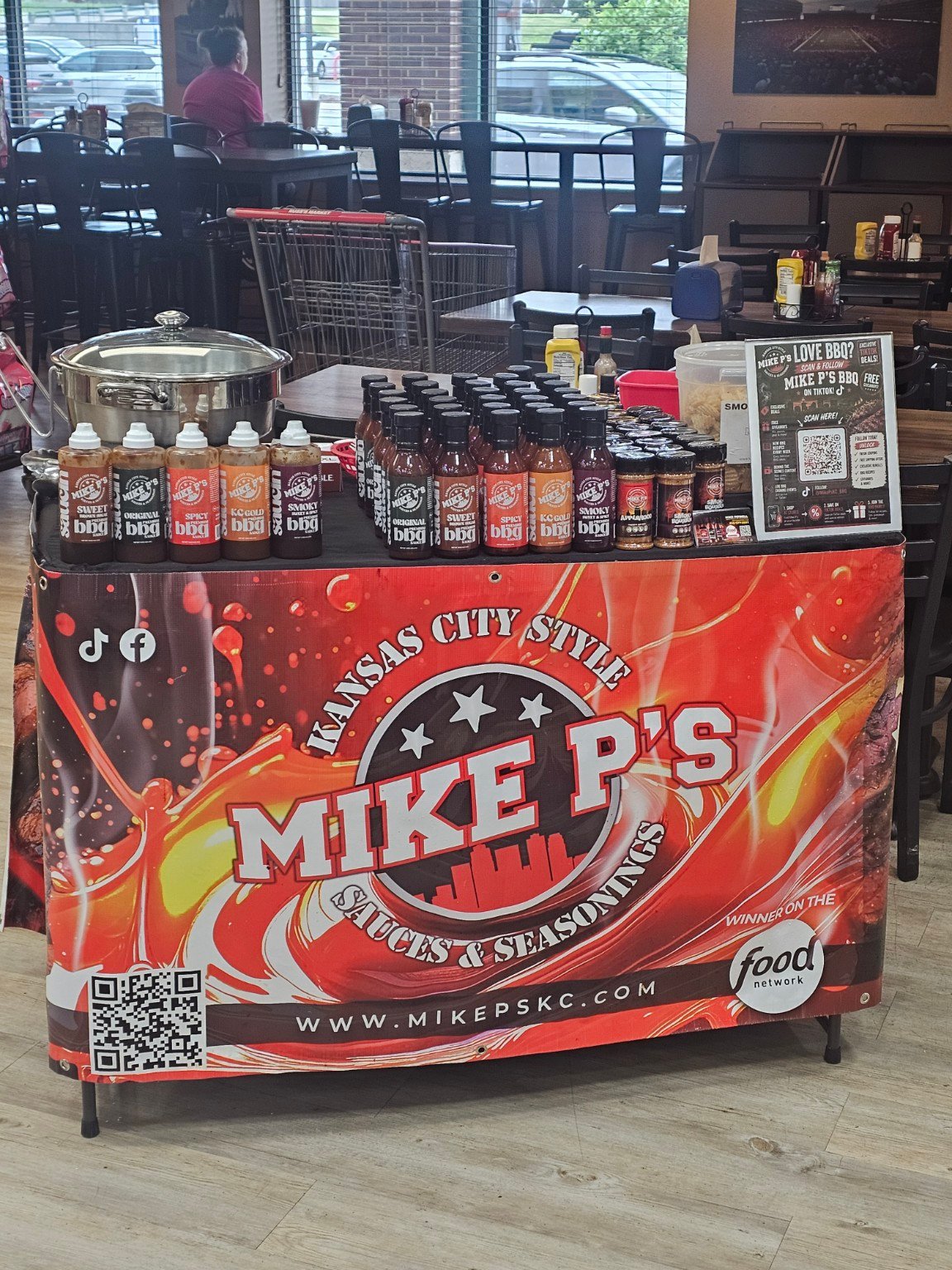 Mike P's sauce and seasoning demo table