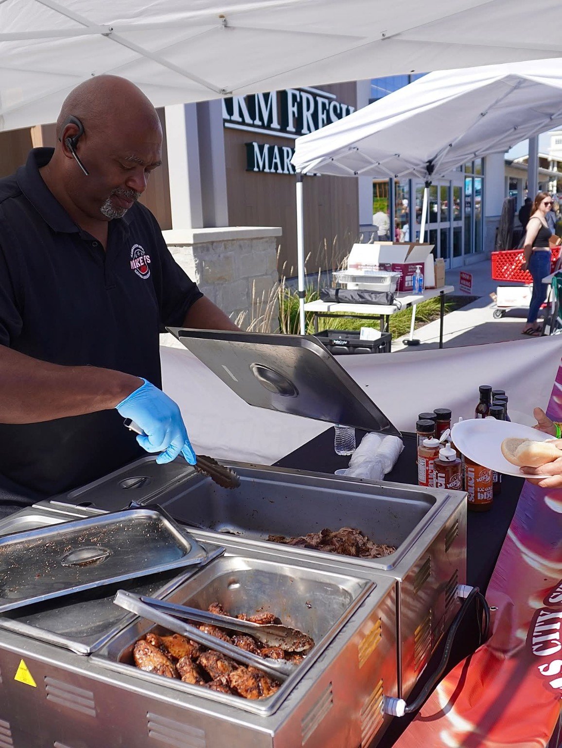 Mike P preparing samples at a live outdoor demo