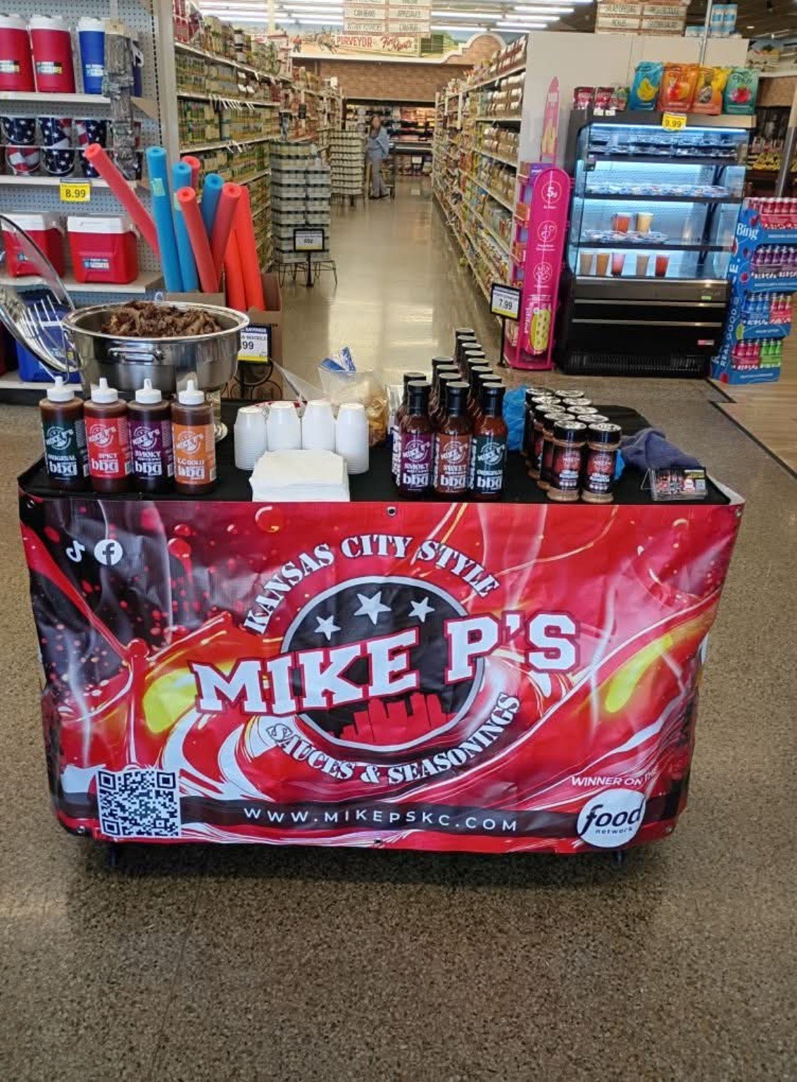 Mike P's product display inside a grocery store