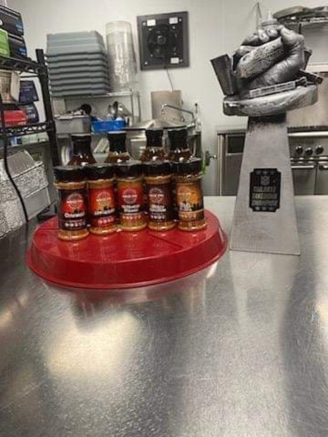 Mike P's products displayed with casino chef award