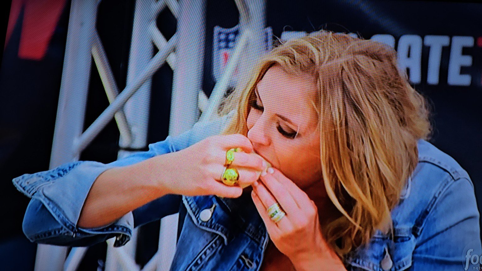 Food Network judge tasting the competition food